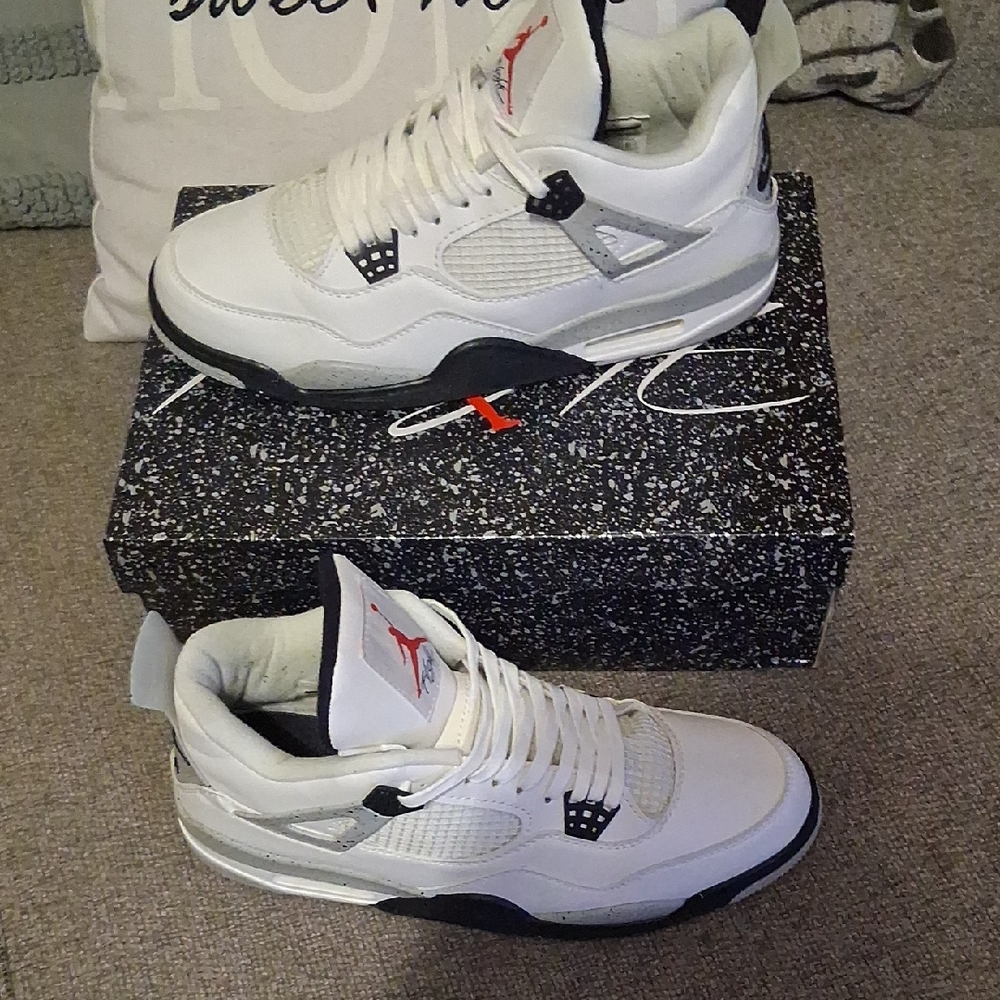 White and Black Sneakers with Red Accents